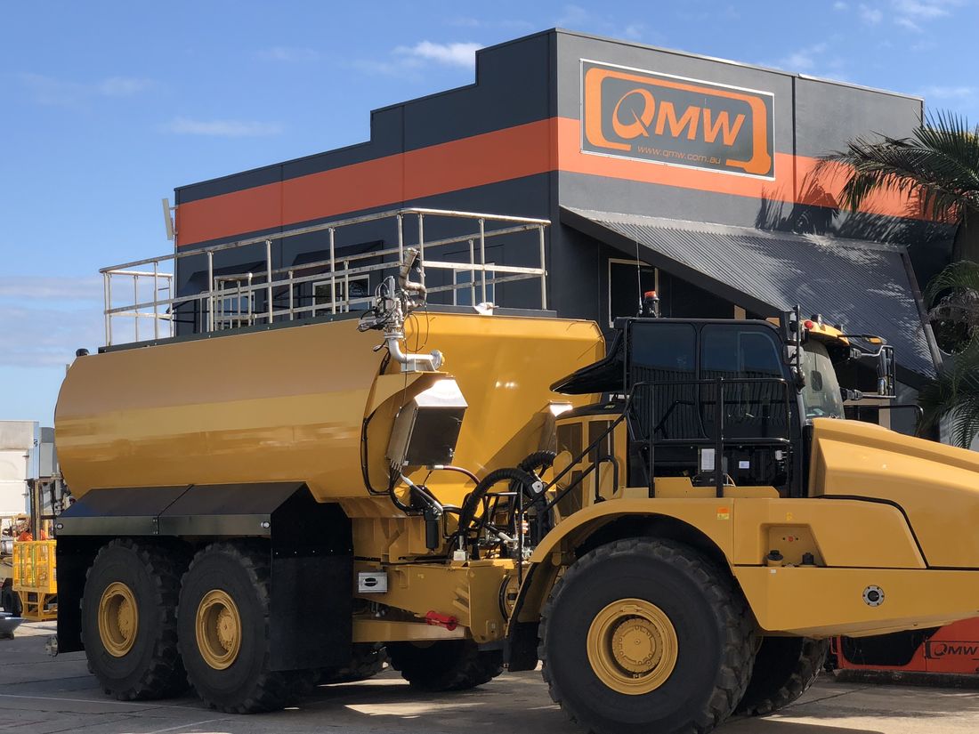 CAT 745 with 32,000L water cart