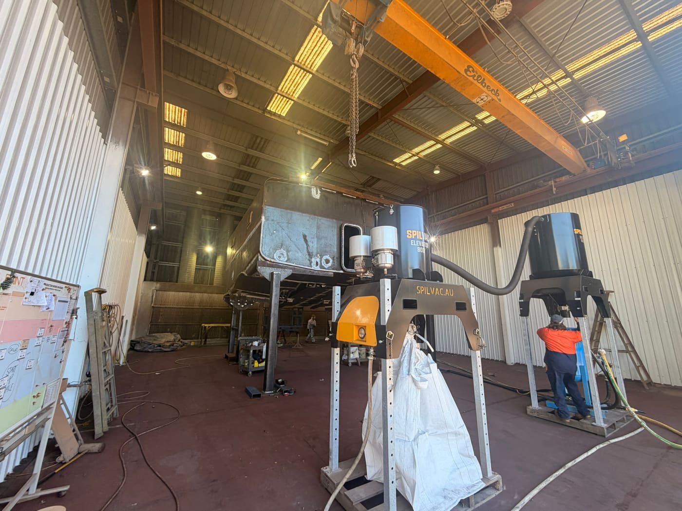 Wide view of the 260 square metre blast and paint booth with overhead crane