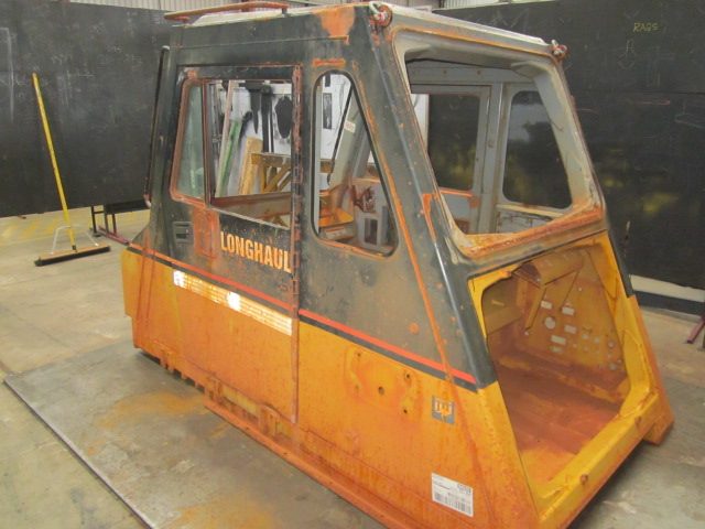 Damaged CAT 777D cabin before repair