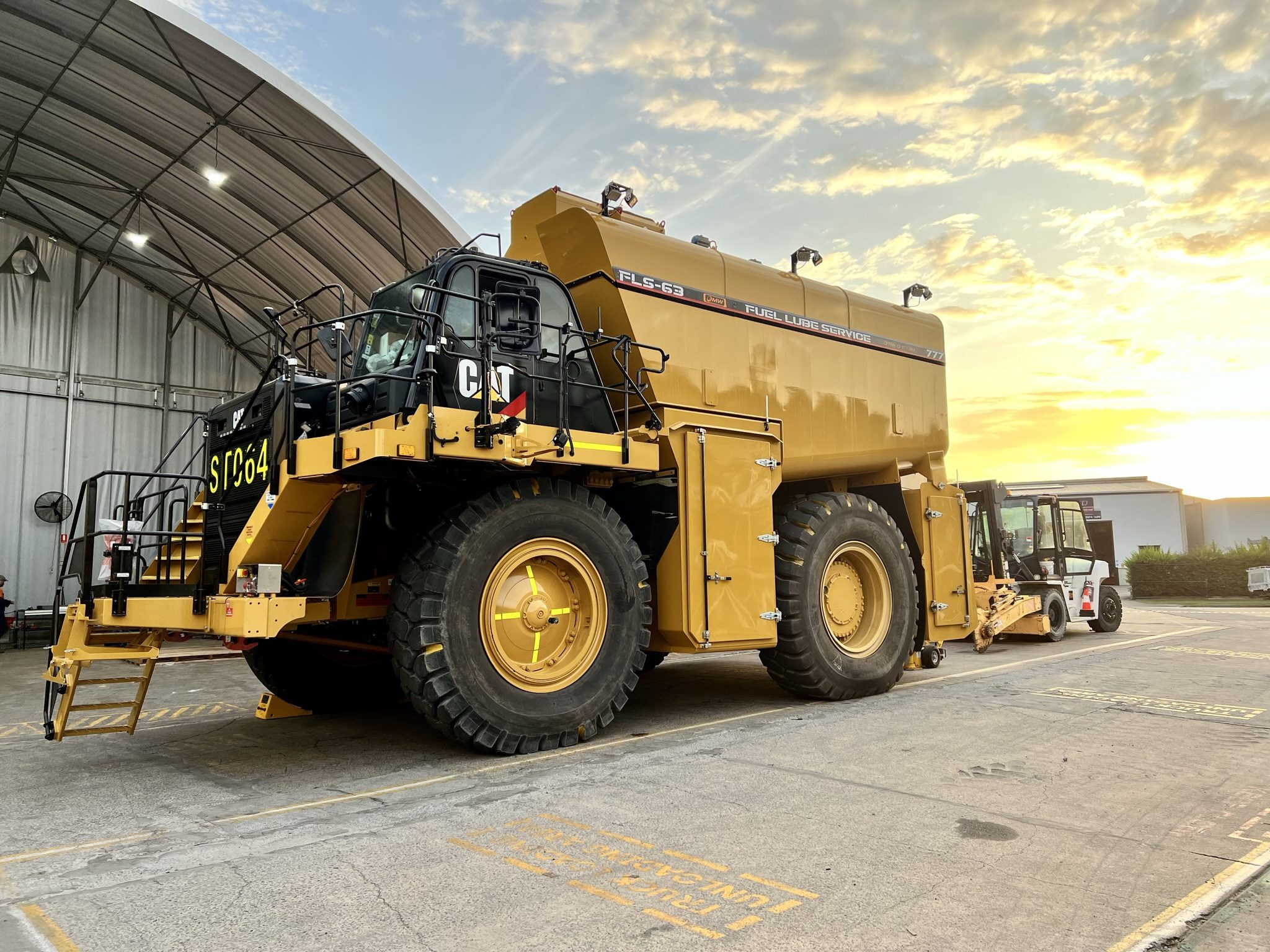 QMW service truck in the workshop shed at first light